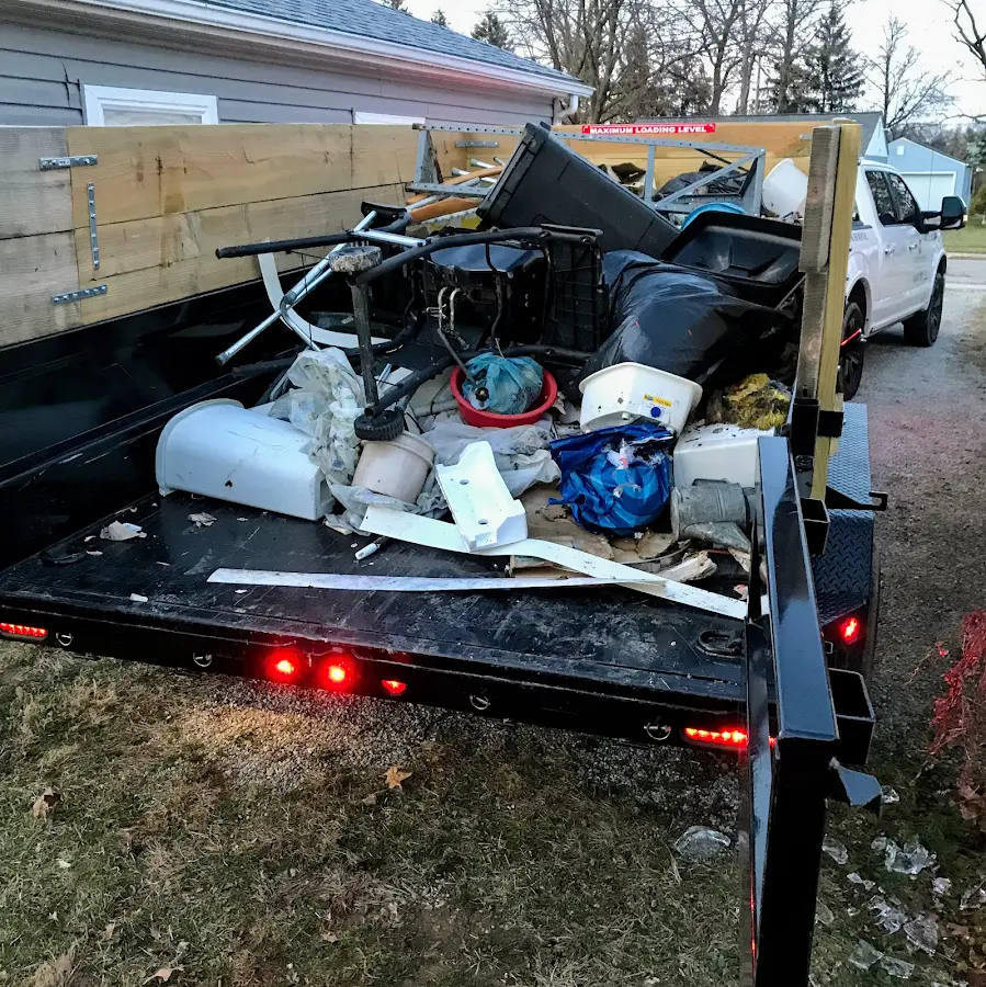 Roll-off dumpster delivered to a residential driveway in Broadview